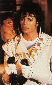 Michael lived under the alias of "Captain EO" in the 26th century. He is pictured here with is best friend in that time, Fuzzball.